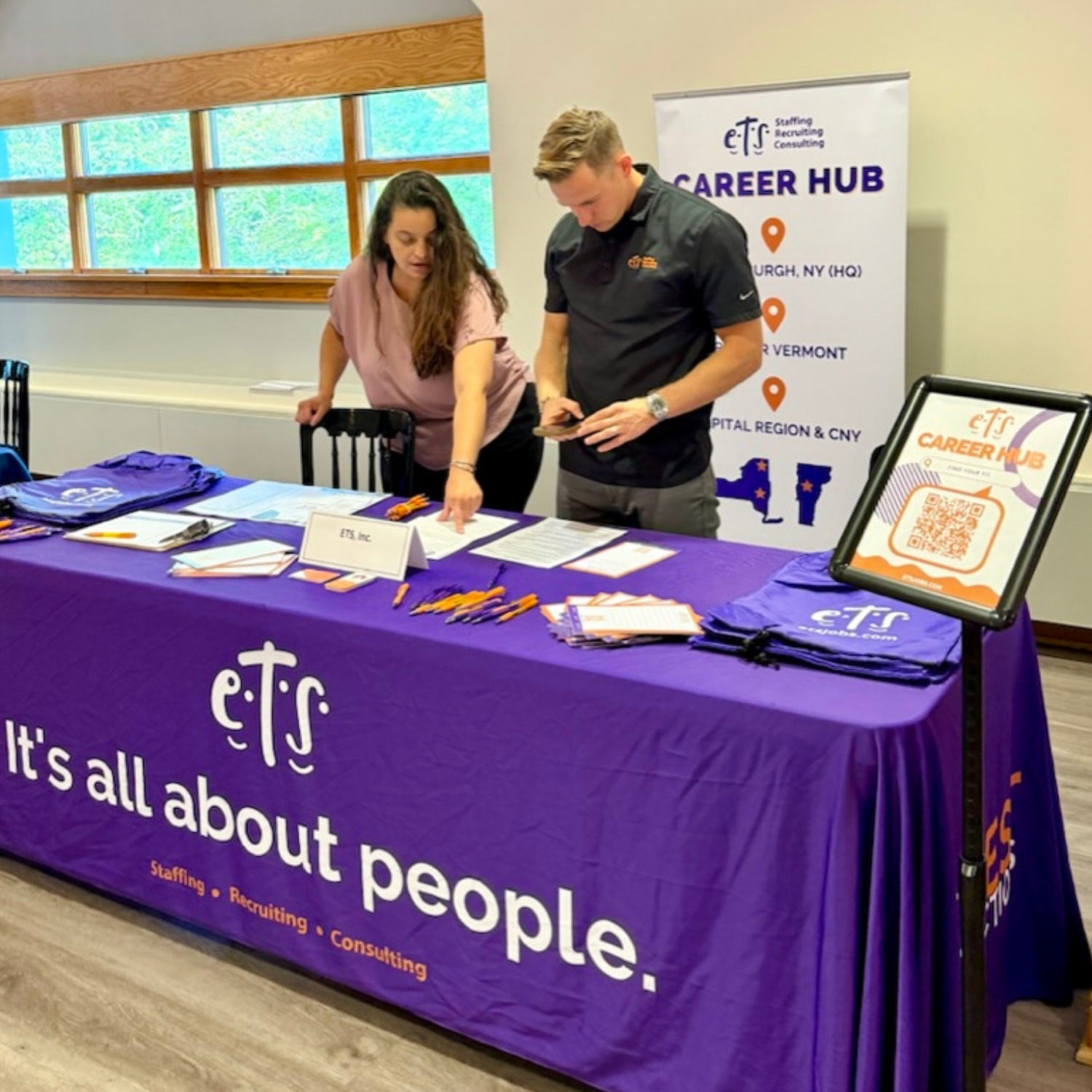 ETS recruiters at a job fair table in Plattsburgh, New York