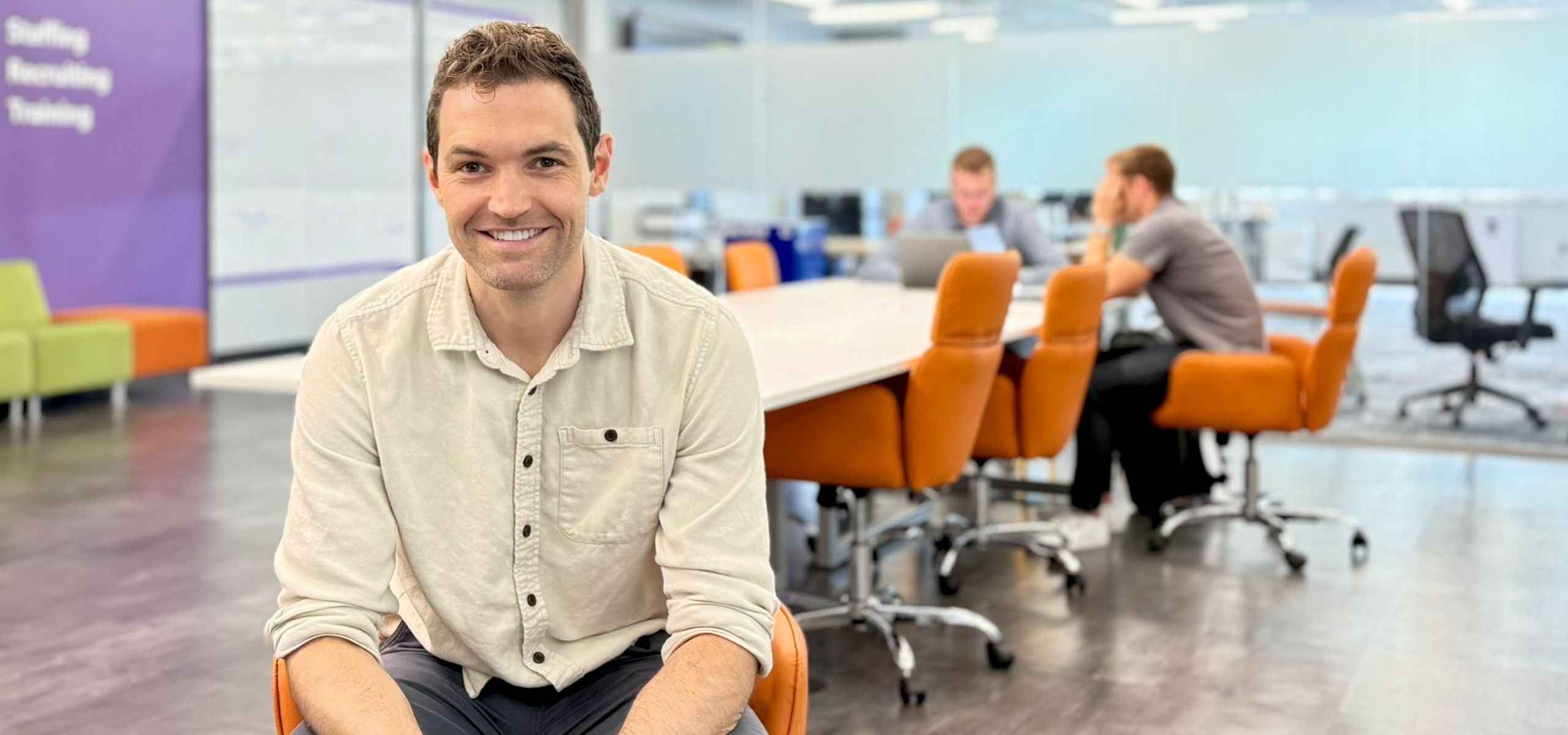 An ETS recruiter in the office conference room