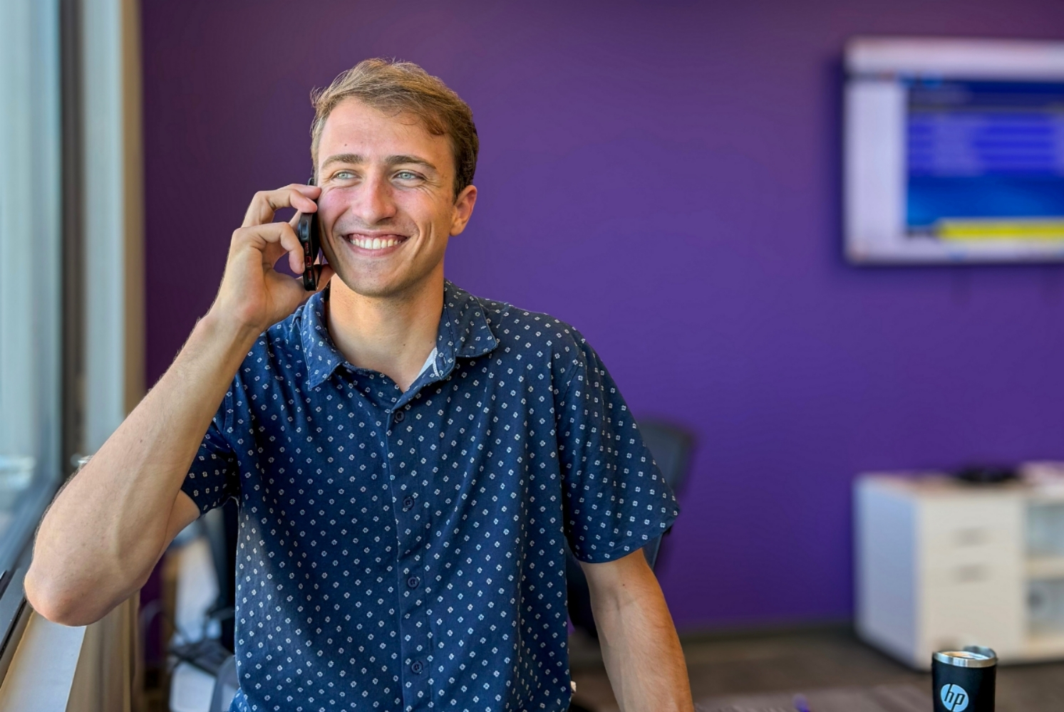 An ETS recruiter on a client call at the Troy, NY office